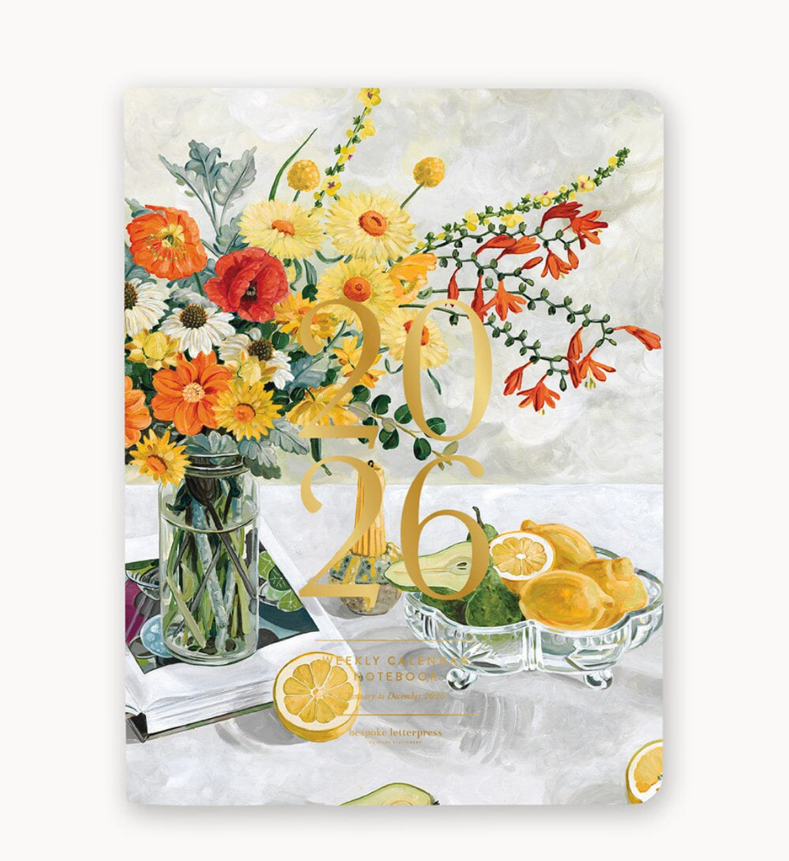 Calendar Notebook with flowers, lemons, and the number '2016' on a marble background.