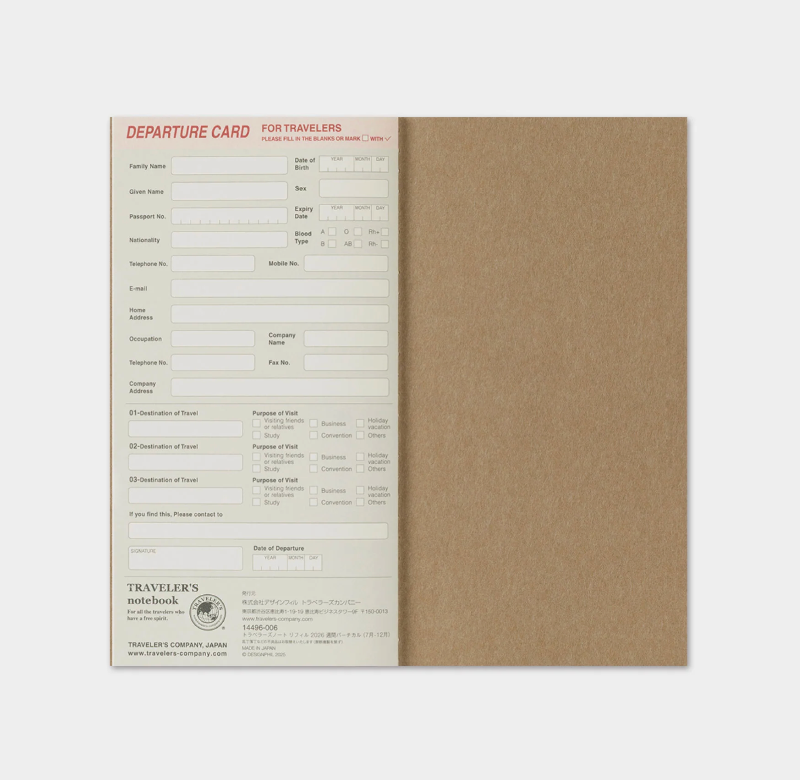 Traveler's notebook with departure card on one side and plain brown cover on the other, on a white background.
