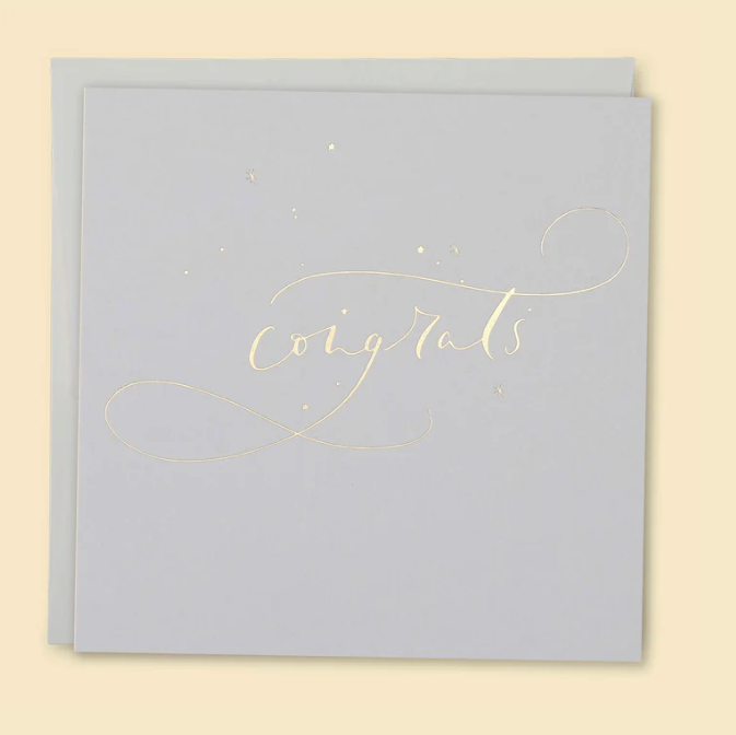 Light grey card with 'Congrats' in gold on a beige background