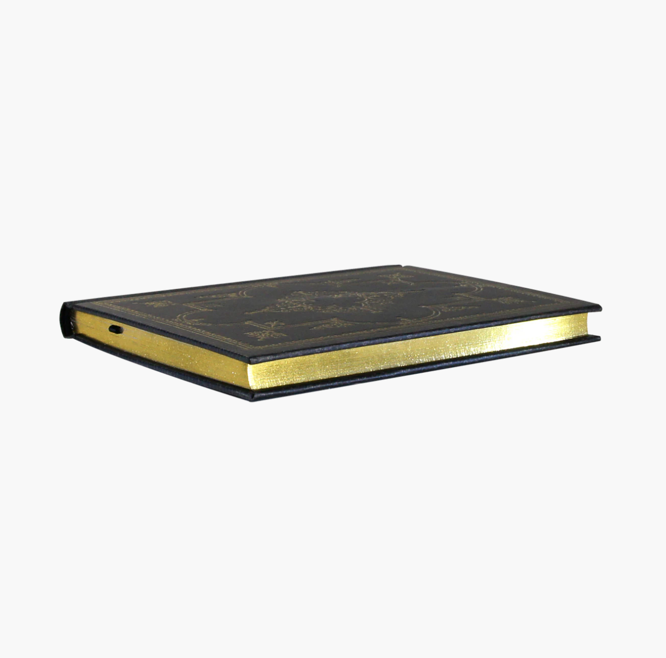 Black bound book with gold edges on a white background