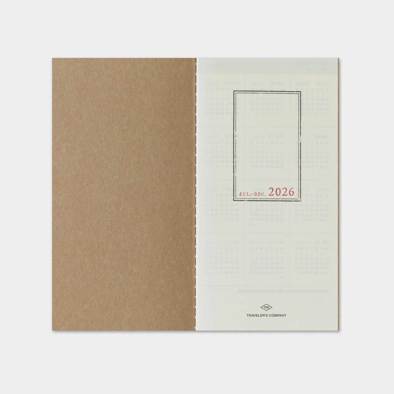 Two-tone planner cover with beige and white sections, featuring '2026' text.