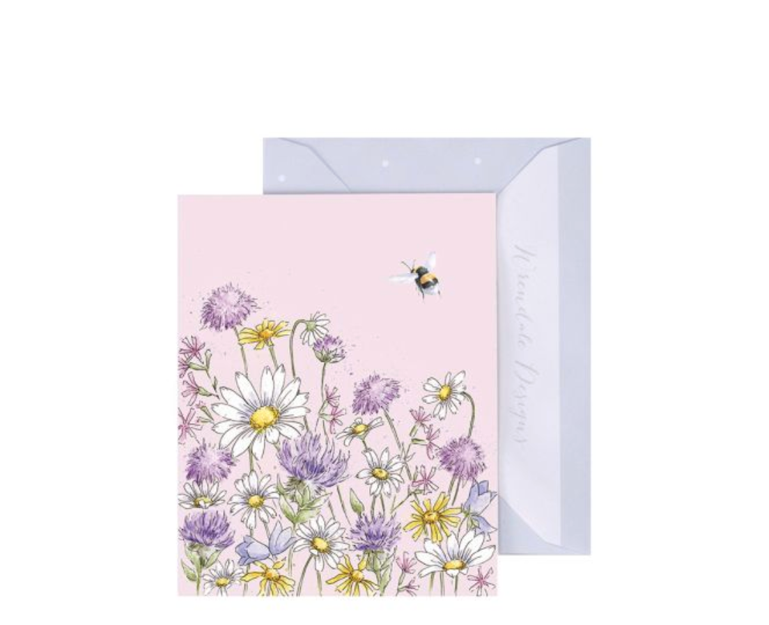 Greeting card with floral design and envelope on a white background