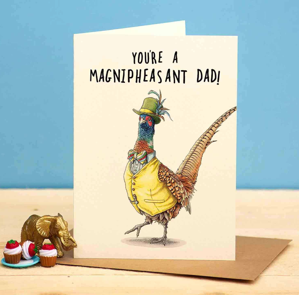 Card with a pheasant illustration and text 'You're a magnipheasant dad!' on a blue background.