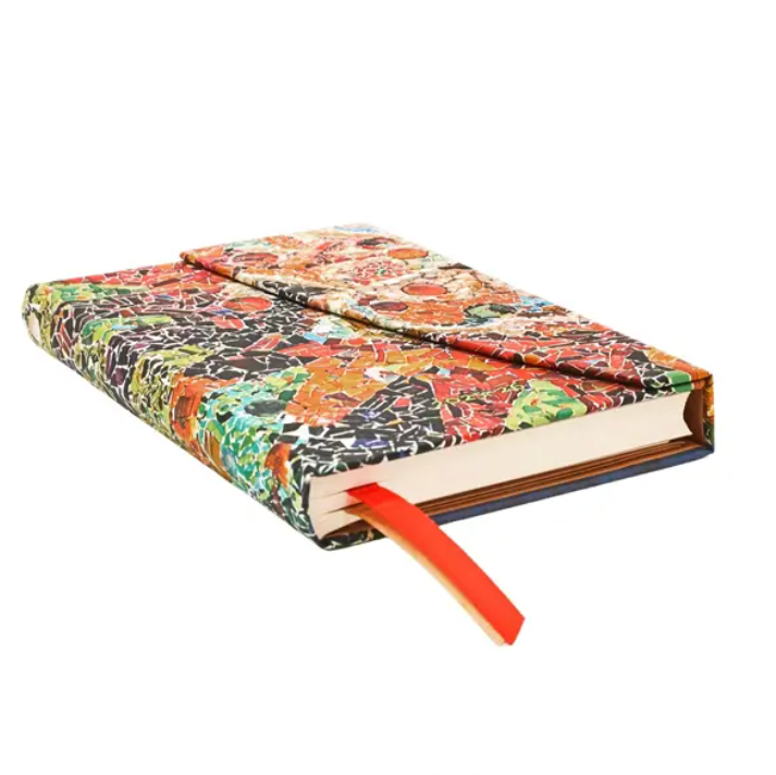 Mosaic-patterned planner with a red ribbon on a white background