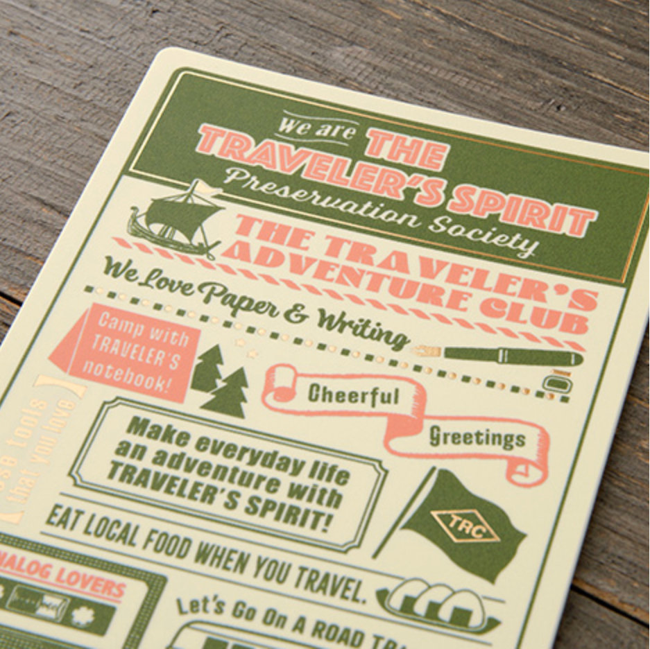 Traveler's Spirit Preservation Society flyer on a wooden surface