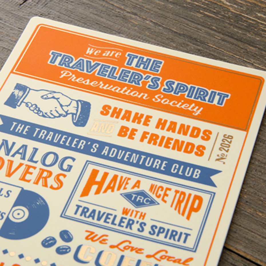 2026 Bookmark with text and graphics on a wooden surface