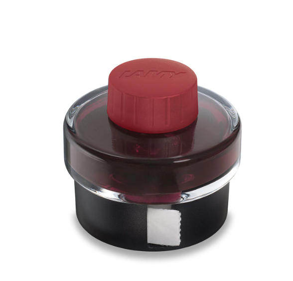 Ink bottle with red cap on a white background