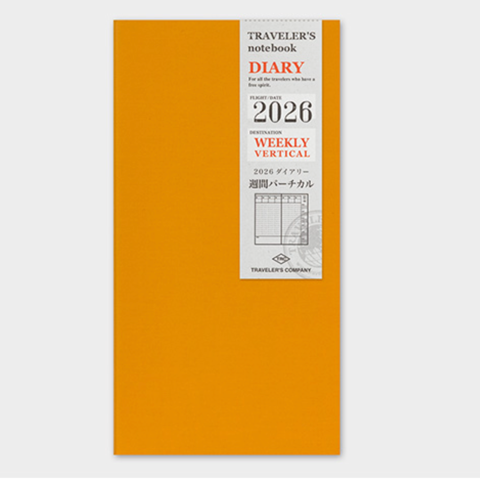 Orange notebook with a white label on a light gray background
