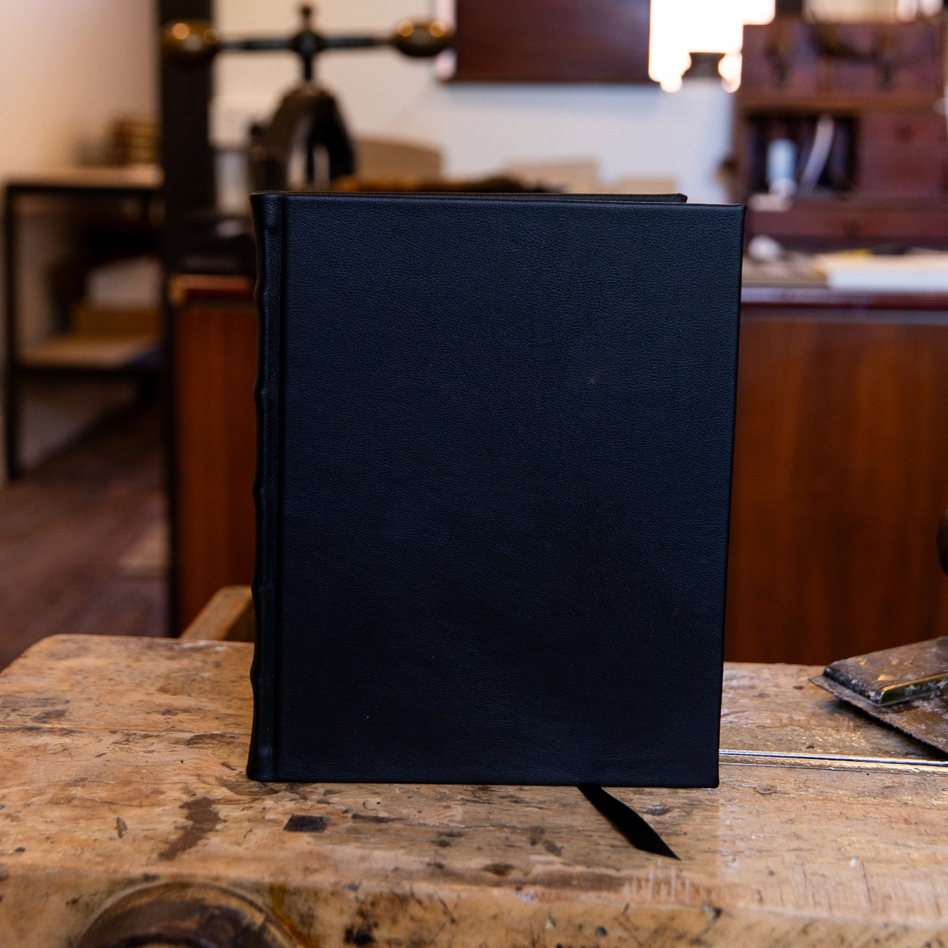 Front-facing view of the large SB Libris Classic Journal in navy leather, highlighting its smooth texture and traditional craftsmanship.