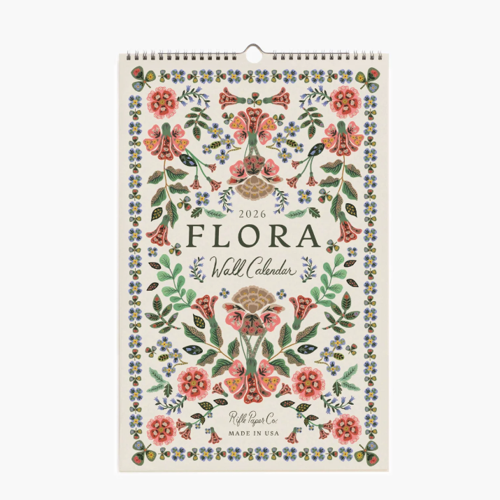 Floral wall calendar with decorative design on a white background