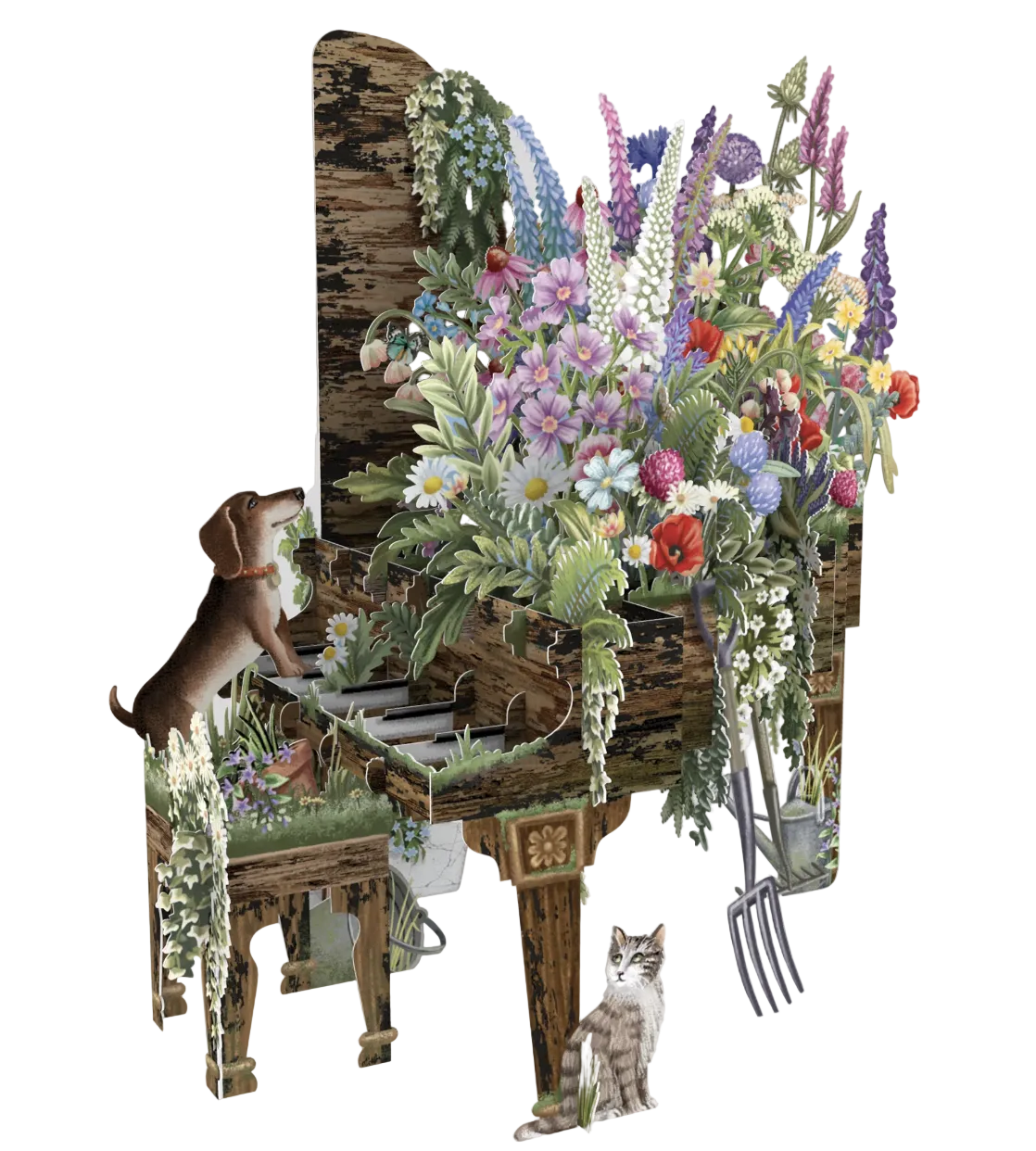 A whimsical garden-themed cardboard cutout scene featuring a wooden bench, abundant wildflowers, a dachshund sitting on the bench, a gray tabby cat at the base, and garden tools including a pitchfork and watering can against a plain white background.