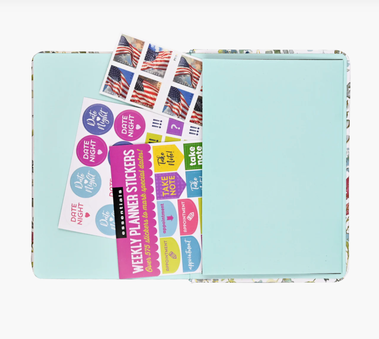 Planner with colorful stickers on a light blue background