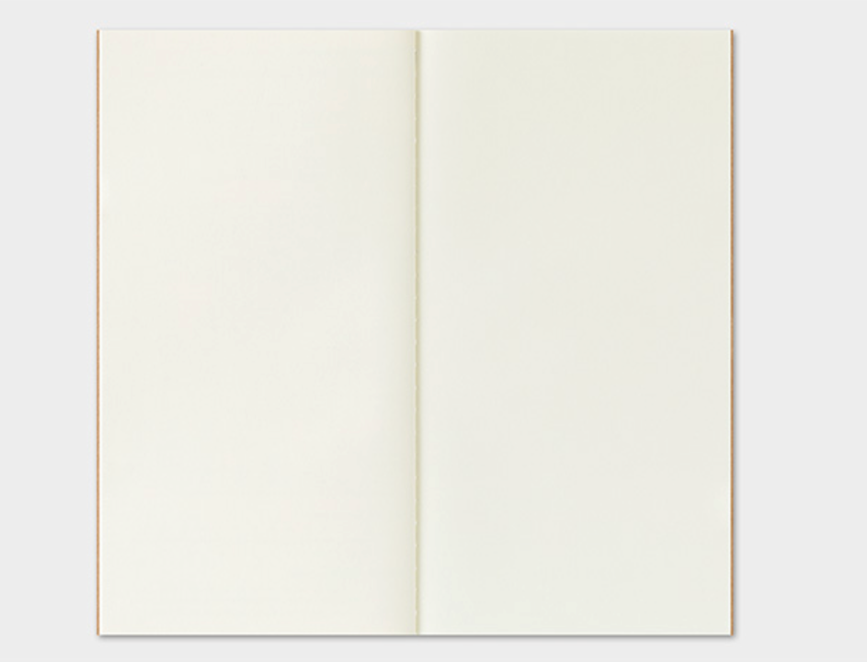 Open notebook with two blank cream pages on a white background
