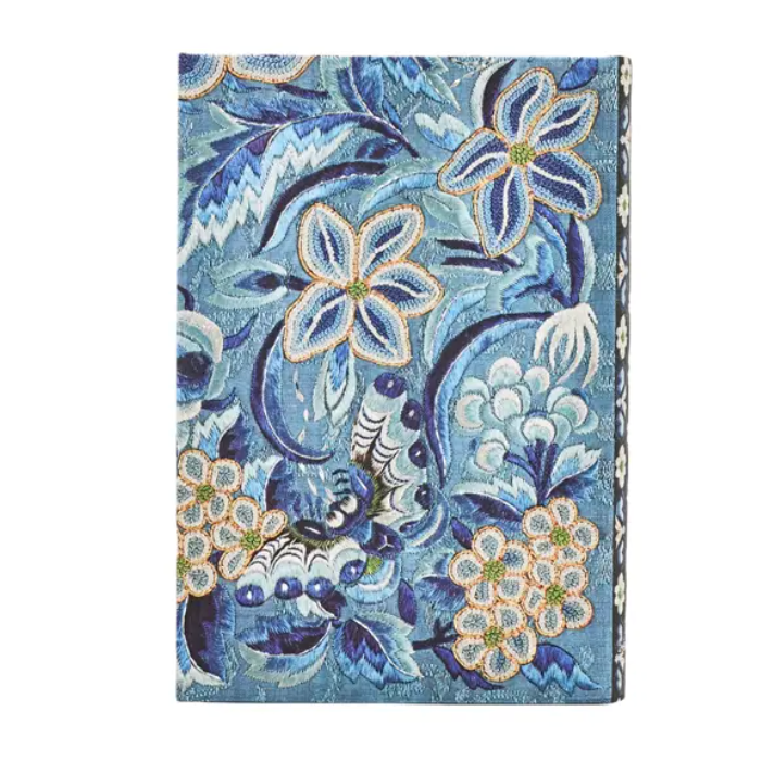 Floral patterned notebook with blue and white flowers on a blue background