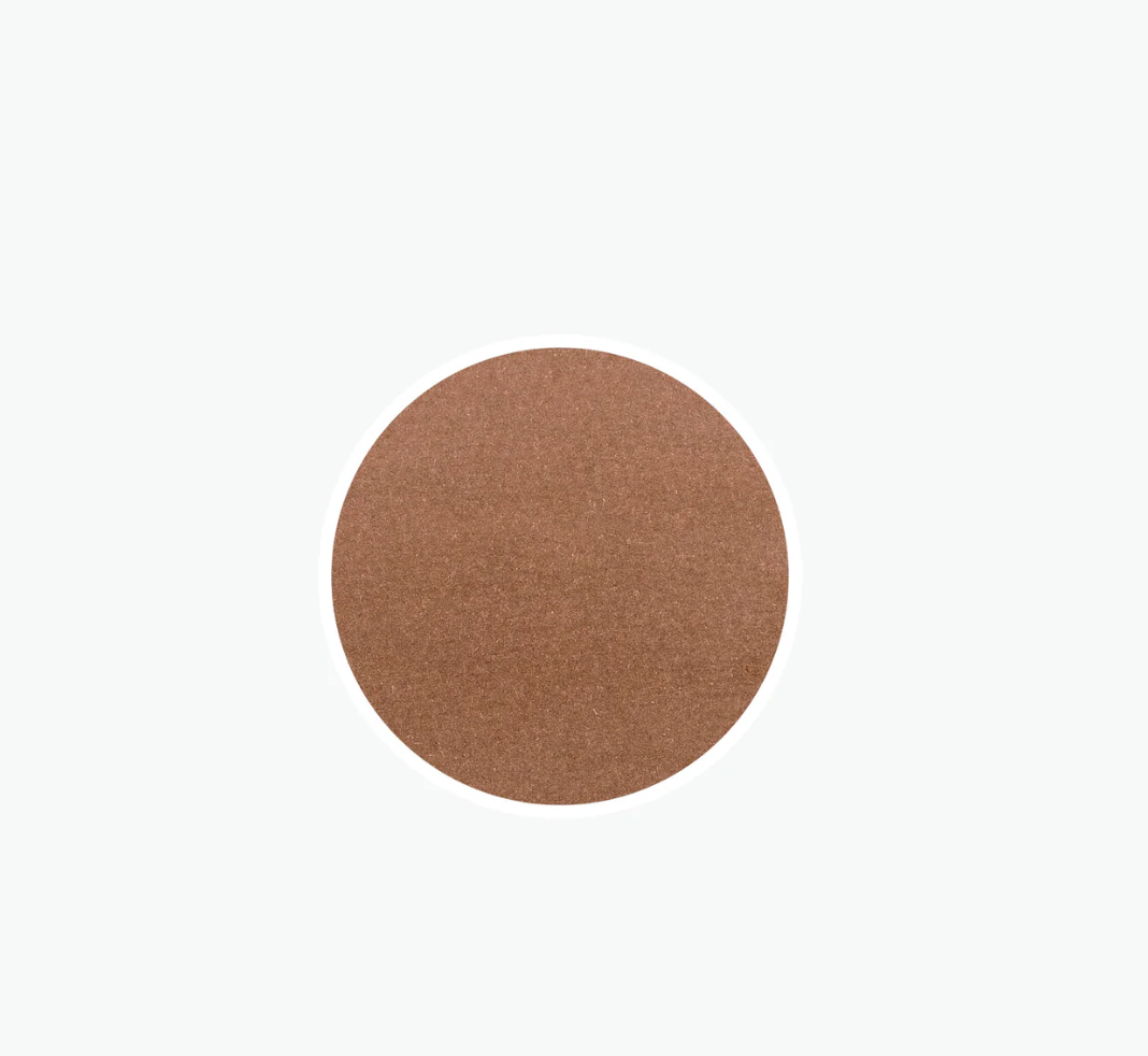 Black circular object on a white background