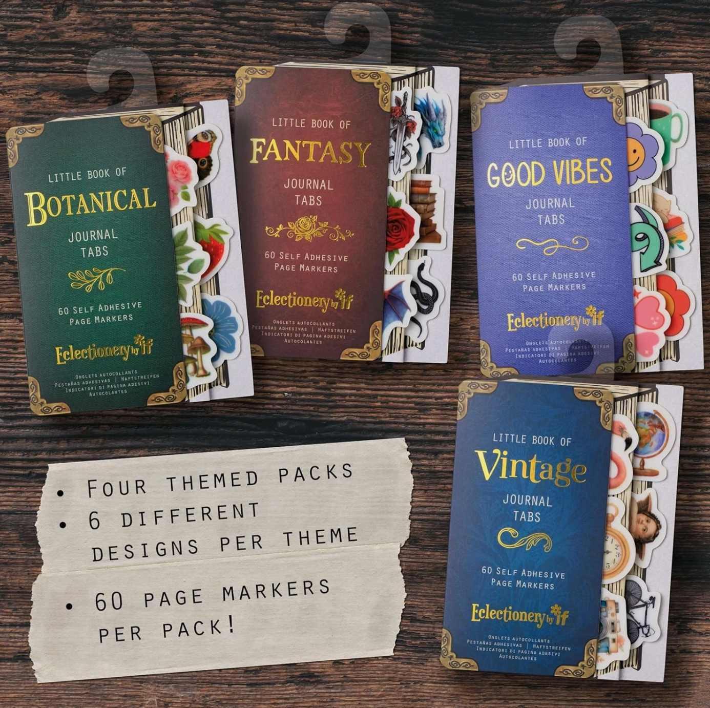 Four themed packs of journal tabs on a wooden surface with descriptive text.