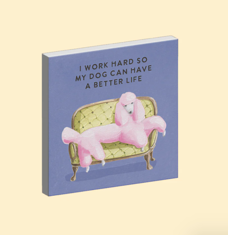 Ceramic magnet with a pink poodle on a green couch and text on a light yellow background