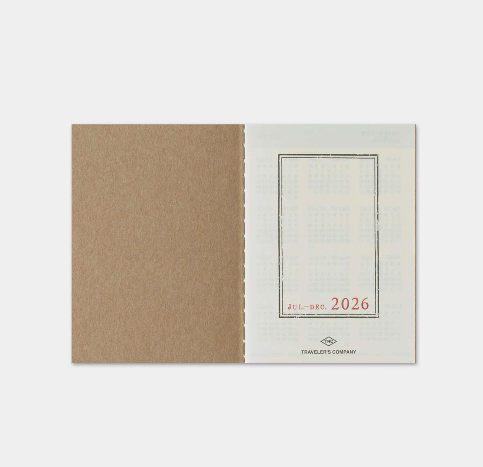 Two-tone notebook with brown and beige cover on a white background
