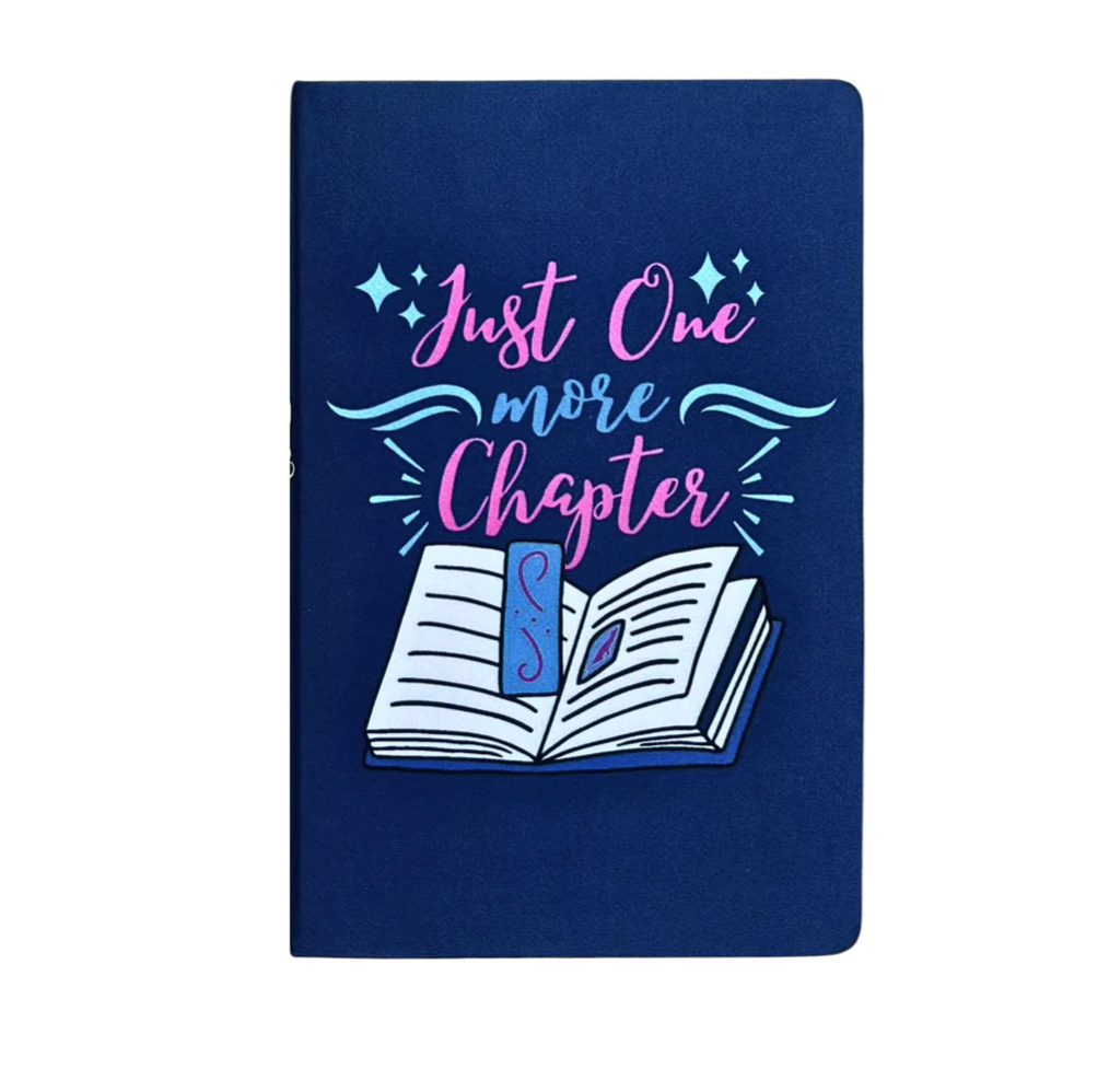 Navy blue notebook with 'Just One More Chapter' design on a white background