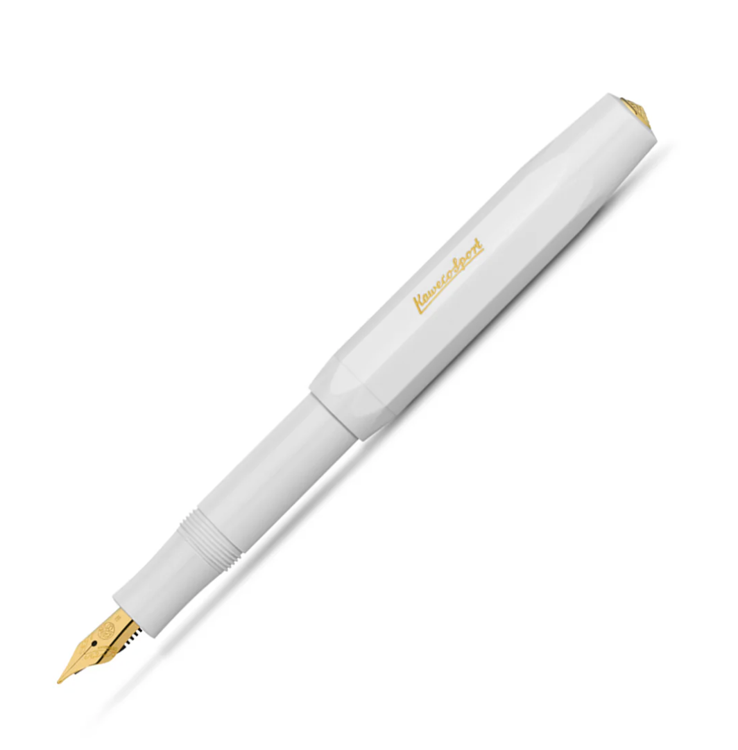 White fountain pen with gold accents on a white background