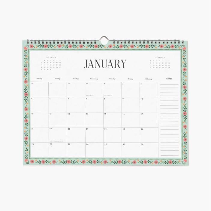 Calendar with floral border on a white background