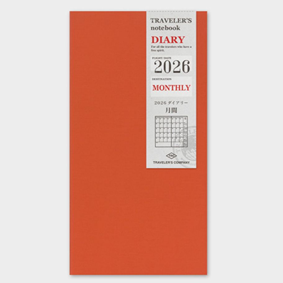 Orange travel notebook with 'Traveler's Company' branding on a white background