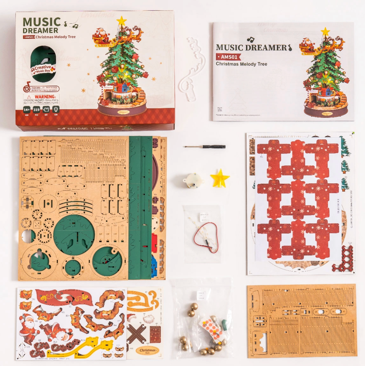 Music Dreamer Christmas Melody Tree kit with packaging, components, and instruction manual on a white background.