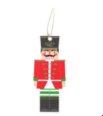 Wooden nutcracker ornament on a white background