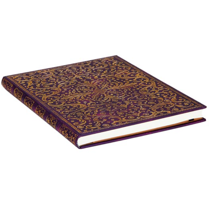 Decorative purple notebook with gold patterns on a white background