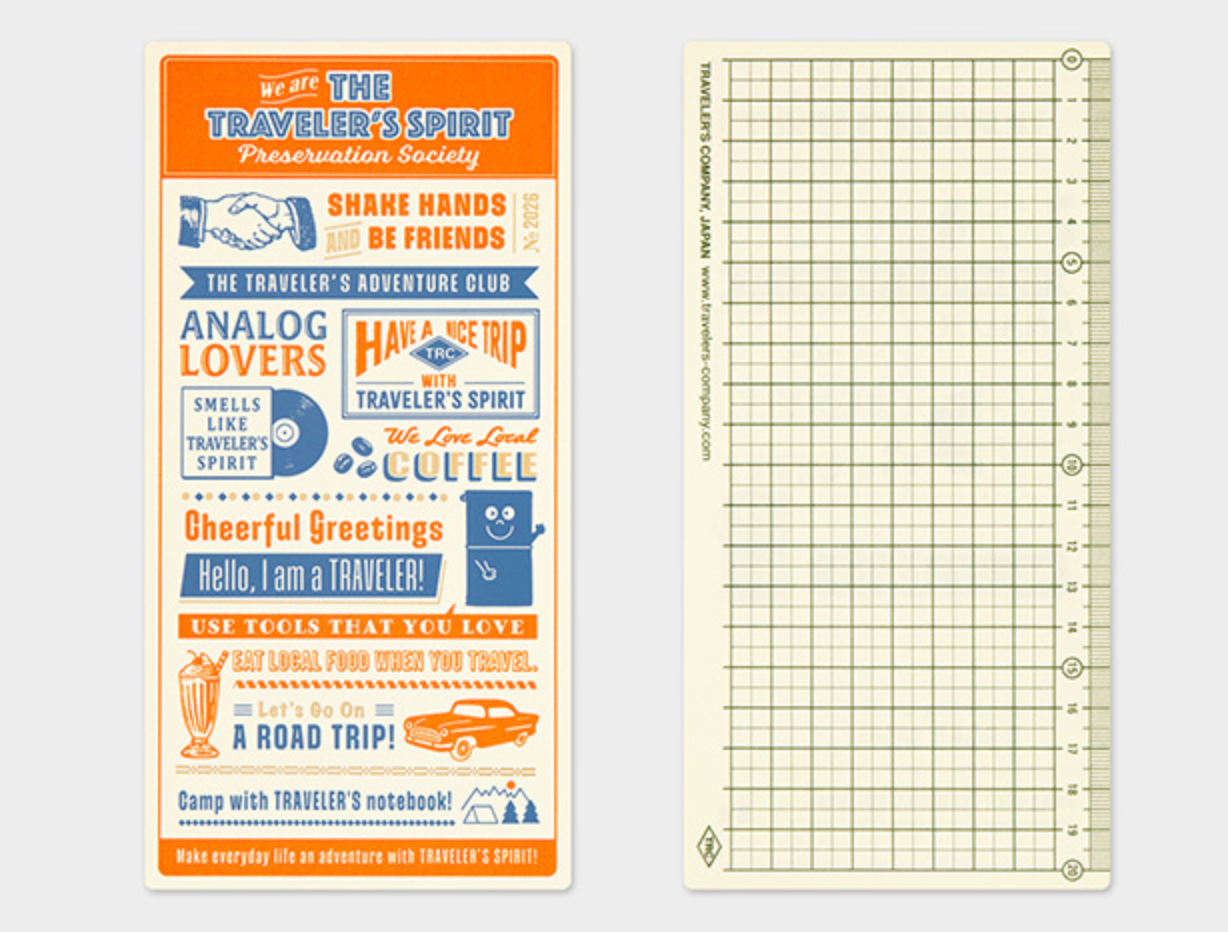 Notebook with decorative cover and grid page on a white background