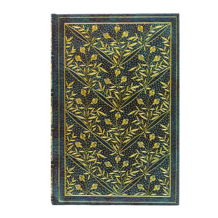 Decorative book with gold leaf pattern on a white background