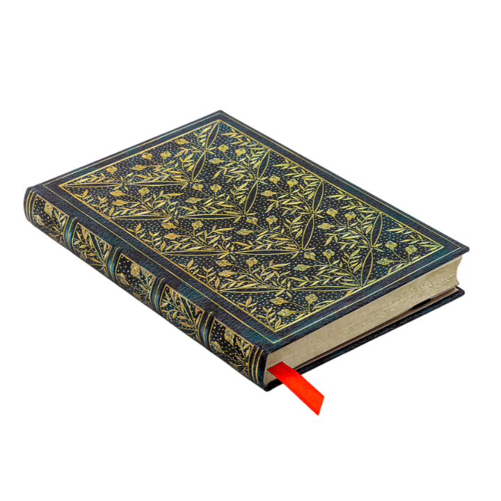 Decorative book with intricate patterns on a white background