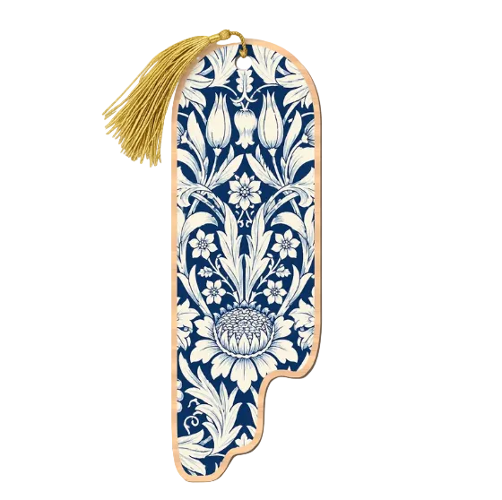 A decorative bookmark featuring a navy blue and white floral pattern with a gold tassel, shown on a pale pink background.