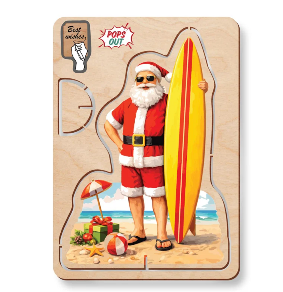 Wooden pop-out Christmas card with Santa in board shorts holding a surfboard on the beach